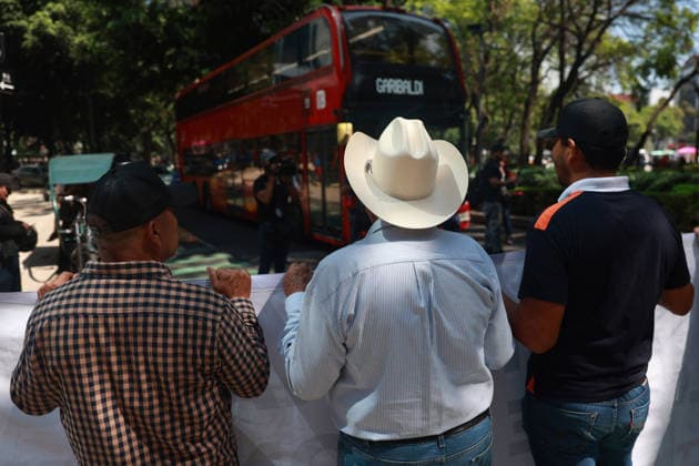 Transport workers and farmers lead rally in Mexico City MEXICO CITY, MEXICO - MAY 20: Transport workers and farmers block traffic along Reforma Avenue as they take part in a rally to demand more security on highways, in Mexico City, Mexico on May 20, 2026. Under the slogan Without support for farmers, there will be no World Cup, hundreds of transport workers and farmers from several states across Mexico gathered to demand greater security nationwide, particularly on highways where criminal activity has increased, as well as more government support for the agricultural sector. Daniel Cardenas Anadolu Mexico City Mexico. Editorial use only. Please get in touch for any other usage.  Copyright: x2026xAnadoluxDanielxCardenasx