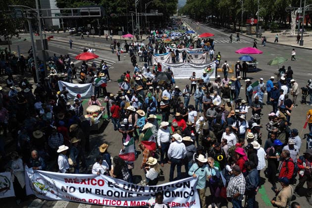 Transport workers and farmers lead rally in Mexico City MEXICO CITY, MEXICO - MAY 20: Transport workers and farmers take part in a rally to demand more security on highways, in Mexico City, Mexico on May 20, 2026. Under the slogan Without support for farmers, there will be no World Cup, hundreds of transport workers and farmers from several states across Mexico gathered to demand greater security nationwide, particularly on highways where criminal activity has increased, as well as more government support for the agricultural sector. Daniel Cardenas Anadolu Mexico City Mexico. Editorial use only. Please get in touch for any other usage.  Copyright: x2026xAnadoluxDanielxCardenasx