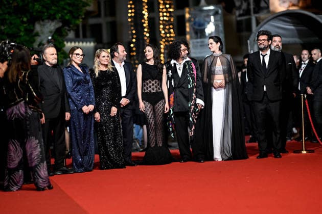 Cannes Screening Roma Elastica JR Franco Nero, Ornella Muti, Isabella Ferrari, Mathieu Verhaeghe, Marion Cotillard, Bertrand Mandico and Noémie Merlant attending the screening of the movie Roma Elastica during the 79th Cannes Film Festival in Cannes, France on May 20, 2026. Photo by Julien Reynaud APS-Medias ABACAPRESS.COM Cannes France  Copyright: xReynaudxJulien APS-Medias ABACAx