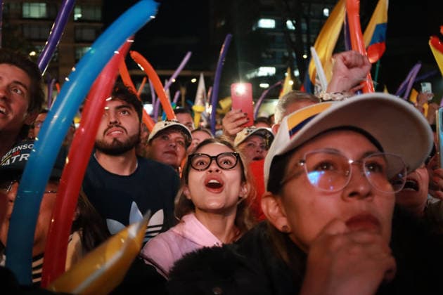 May 20, 2026, Bogota, Cundinamarca, COLOMBIA: Followers of right-wing presidential candidate ABELARDO DE LA ESPRIELLA cheer him on as he addresses the crowd during his campaign closing rally ahead of the first-round presidential vote May 31st. The high-security setup serves as a stark visual reminder of Colombia s electoral history, where the threat of political violence has historically cast a shadow over democratic campaigns. Bogota COLOMBIA  - ZUMAd225 20260520_znp_d225_007 Copyright: xZoraidaxDiazx