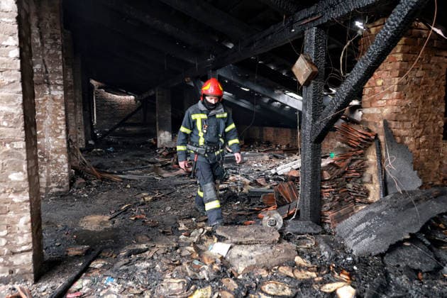 RECORD DATE NOT STATED A firefighter works to eliminate the aftermath of a Russian drone attack in Odesa, Ukraine, on May 18, 2026. As a result of a massive overnight attack by Russian strike drones, several residential buildings in the Prymorskyi and Kyivskyi districts sustained significant damage. Roofs of three-storey buildings were destroyed, while a one-storey house was ruined in another area. Buildings of a city lyceum and a kindergarten were also damaged. Two people, an 11-year-old boy and a 59-year-old man, were injured (Photo by Nina Liashonok Ukrinform) Russian drone attack on Odesa leaves people injured  Copyright: xNinaxLiashonokx