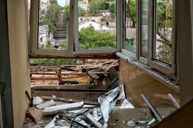 RECORD DATE NOT STATED A balcony damaged in a Russian drone attack in Odesa, Ukraine, on May 18, 2026. As a result of a massive overnight attack by Russian strike drones, several residential buildings in the Prymorskyi and Kyivskyi districts sustained significant damage. Roofs of three-storey buildings were destroyed, while a one-storey house was ruined in another area. Buildings of a city lyceum and a kindergarten were also damaged. Two people, an 11-year-old boy and a 59-year-old man, were injured (Photo by Nina Liashonok Ukrinform) Russian drone attack on Odesa leaves people injured  Copyright: xNinaxLiashonokx