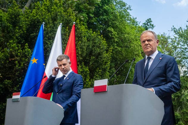 May 20, 2026, Warsaw, Poland: New Hungarian Prime Minister, Peter Magyar and Polish Prime Minister, Donald Tusk held a joint press conference during their meeting at the Polish Prime Minister s residence. On the morning of Wednesday, the 20th of May, on his first foreign visit, the new Prime Minister of Hungary, Peter Magyar, meets with Polish Prime Minister Donald Tusk. The visit symbolically marks the opening of a new phase in Budapest s relations with Europe. During the meeting the Prime Ministers discuss Magyar s victory in the recent Hungarian elections, the Polish-Hungarian relationship, and the issue of Zbigniew Ziobra and Marcin Romanowski - two Polish politicians evading prosecution in Poland by hiding in Hungary. After the meeting  - ZUMAs197 20260520_aaa_s197_274 Copyright: xNeilxMiltonx