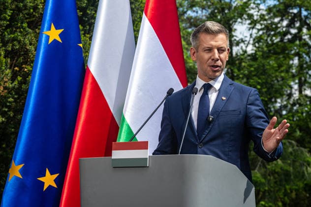 May 20, 2026, Warsaw, Poland: New Hungarian Prime Minister, Peter Magyar seen talking to the press during his meeting with the Polish Prime Minister, Donald Tusk . On the morning of Wednesday, the 20th of May, on his first foreign visit, the new Prime Minister of Hungary, Peter Magyar, meets with Polish Prime Minister Donald Tusk. The visit symbolically marks the opening of a new phase in Budapest s relations with Europe. During the meeting the Prime Ministers discuss Magyar s victory in the recent Hungarian elections, the Polish-Hungarian relationship, and the issue of Zbigniew Ziobra and Marcin Romanowski - two Polish politicians evading prosecution in Poland by hiding in Hungary. After the meeting, Peter Magyar meets with the Polish Pres - ZUMAs197 20260520_aaa_s197_258 Copyright: xNeilxMiltonx