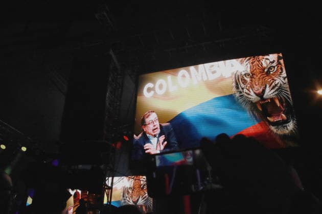 May 20, 2026, Bogota, Cundinamarca, COLOMBIA: A giant screen at the campaign closing rally for right-wing presidential candidate ABELARDO DE LA ESPRIELLA, shows the President of Colombia GUSTAVO PETRO cowering before a tiger. El Tigre (The Tiger) is the central symbol, campaign nickname, and political persona of DE LA ESPRIELLA. His independent movement, Firmes por la Patria (Firm for the Homeland), centers its entire identity on this predatory mascot to project a distinct political brand representing a hardline stance on crime, stating that the tiger bites hard when dealing with corrupt politicians, urban criminals, and left-wing guerrillas. Bogota COLOMBIA - ZUMAd225 20260520_znp_d225_009 Copyright: xZoraidaxDiazx
