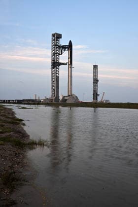 The SpaceX Super Heavy Booster and Starship spacecraft stand on Orbital Launch Pad 2 at Starbase, Texas during the early evening on Wednesday May 20, 2026. SpaceX remains on schedule so far for a launch attempt on Thursday, May 21. SpaceX is monitoring all the upgrades made on the new pad, the booster and Starship. The launch window will open at 5:30 PM.  SBP20260520004 JOExMARINO