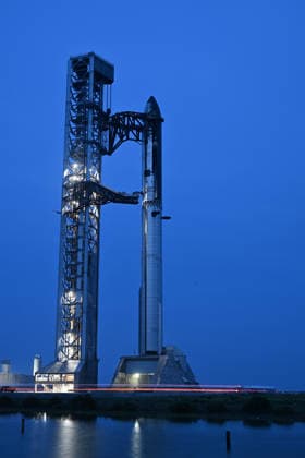 The SpaceX Super Heavy Booster and Starship spacecraft stand on Orbital Launch Pad 2 at Starbase, Texas during the early evening on Wednesday May 20, 2026. SpaceX remains on schedule so far for a launch attempt on Thursday, May 21. SpaceX is monitoring all the upgrades made on the new pad, the booster and Starship. The launch window will open at 5:30 PM.  SBP20260520007 JOExMARINO
