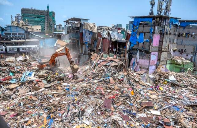 MUMBAI, INDIA - MAY 20: JCB machines in action on second day of an anti-encroachment drive on railway land at Garib Nagar slum in Bandra East on May 20, 2026 in Mumbai, India. (Photo by Satish Bate Hindustan Times) Second Day Of Demolition Drive At Bandra Garib Nagar