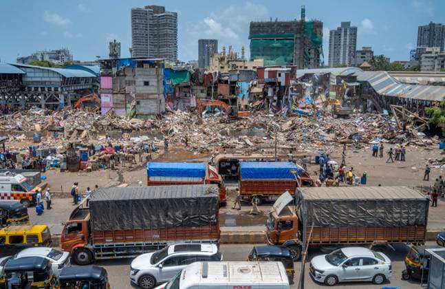 MUMBAI, INDIA - MAY 20: JCB machines in action on second day of an anti-encroachment drive on railway land at Garib Nagar slum in Bandra East on May 20, 2026 in Mumbai, India. (Photo by Satish Bate Hindustan Times) Second Day Of Demolition Drive At Bandra Garib Nagar