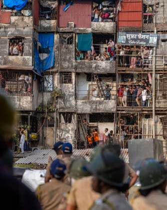 MUMBAI, INDIA - MAY 20: Heavy police deployment on the second day of an anti-encroachment drive at Garib Nagar slum on railway land on May 20, 2026 in Mumbai, India. (Photo by Satish Bate Hindustan Times) Second Day Of Demolition Drive At Bandra Garib Nagar