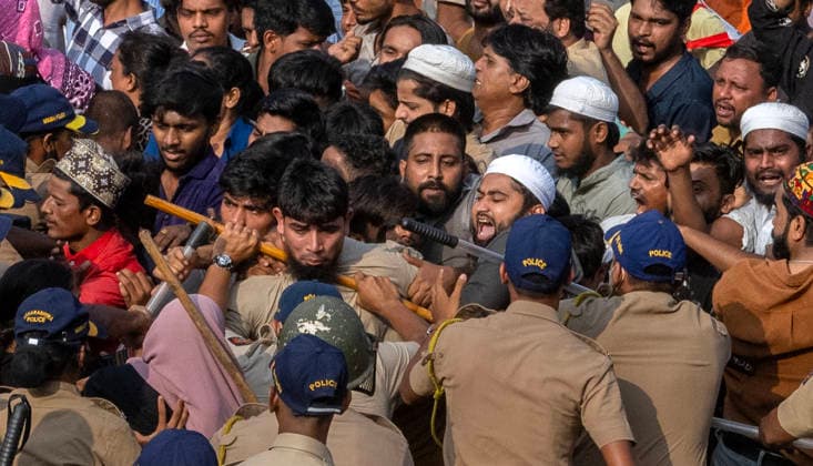 MUMBAI, INDIA - MAY 20: Residents of Garib Nagar slum clash with Police on the second day of an anti-encroachment drive on railway land on May 20, 2026 in Mumbai, India. (Photo by Satish Bate Hindustan Times) Second Day Of Demolition Drive At Bandra Garib Nagar