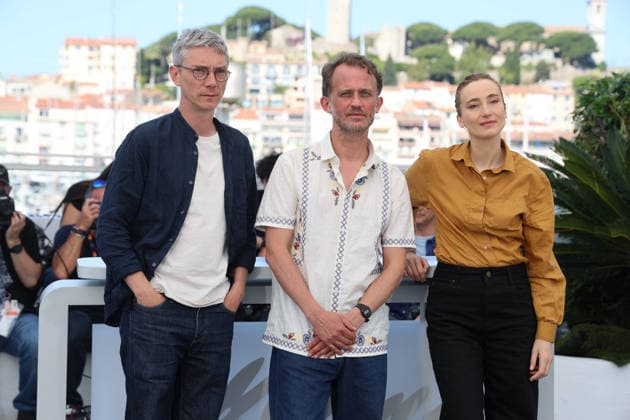 May 21, 2026, Cannes, France: Swann Arlaud, Emmanuel Marre and Sandrine Blancke pose at the photocall of Notre Salut (A Man of his Time) during the 79th Cannes Film Festival at Palais des Festivals in Cannes, France, on 20 May 2026. Photo: Cannes France - ZUMAm179 20260521_zep_m179_046 Copyright: xAlecxMichaelx