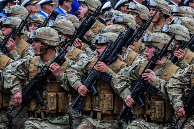May 21, 2026, Valparaiso, Chile: Military personnel parade with weapons during the 147th commemoration of Naval Glories Day. Commemoration number 147 of Naval Glories Day, with the presence of the president of Chile Jose Antonio Kast, in the city of Valparaiso, Chile. Valparaiso Chile - ZUMAs197 20260521_aaa_s197_093 Copyright: xCristobalxBasaurexArayax