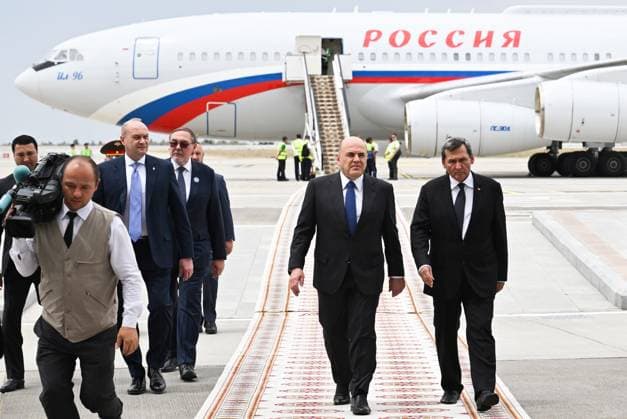 Turkmenistan CIS Government Heads Council 9171282 22.05.2026 Russian Prime Minister Mikhail Mishustin, accompanied by Turkmen Deputy Prime Minister - Foreign Minister Rashid Meredov, arrives at Ashgabat International Airport, Turkmenistan. Alexander Miridonov Sputnik Ashgabat Turkmenistan  Copyright: xAlexanderxMiridonovx