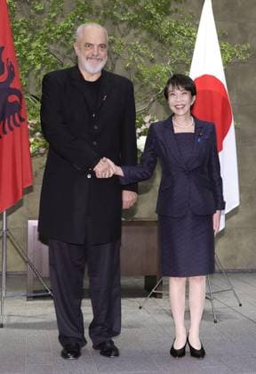 Japan-Albania talks Japanese Prime Minister Sanae Takaichi (R) shakes hands with her Albanian counterpart Edi Rama before their talks at the premier s office in Tokyo on May 22, 2026.  A14AA0005598346P