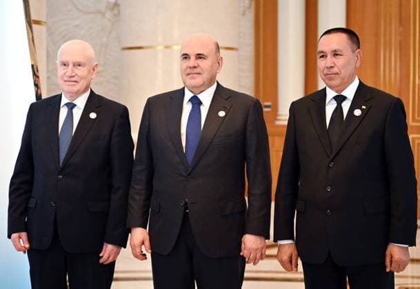 Turkmenistan CIS Government Heads Council 9171410 22.05.2026 CIS Secretary General Sergei Lebedev, Russian Prime Minister Mikhail Mishustin and Turkmen Deputy Prime Minister Hojamyrat Geldimyradov pose for a group photo before a narrow format meeting of the Commonwealth of Independent States (CIS) Heads of Government Council in Ashgabat, Turkmenistan. Alexander Miridonov Sputnik Ashgabat Turkmenistan  Copyright: xAlexanderxMiridonovx