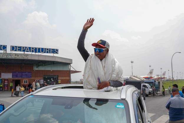 Nepalese climber Kami Rita Sherpa extends world record with 32nd Mount Everest climb KATHMANDU, NEPAL-MAY 22: Kami Rita Sherpa, 56, waves upon his arrival at the airport in Kathmandu, Nepal, on May 22, 2026, after the veteran mountaineer and guide set a new record by successfully summiting Mount Everest for the 32nd time. Sunil Pradhan Anadolu Kathmandu Nepal. Editorial use only. Please get in touch for any other usage.  Copyright: x2026xAnadoluxSunilxPradhanx
