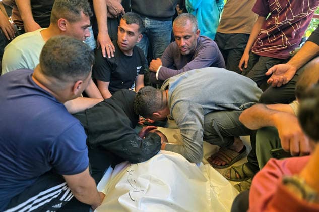 Palestinians Mourn Shepherd Killed Near Khan Younis Palestinians mourn the body of Raafat Breika, 42, who was killed by Israeli army fire while herding sheep near the Yellow Line south of Khan Younis in the southern Gaza Strip, on May 22, 2026. Photo by Tariq Mohammad APA Images Khan Yunis Gaza Strip Palestinian Territory 220526_Khan_Yunis_TM_00(3) Copyright: xapaimagesxTariqxMohammad xapaimagesx