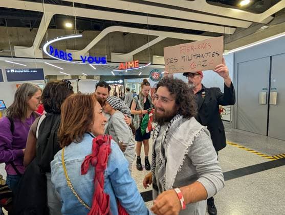 Protesters welcome returned Global Sumud Flotilla activists at Paris airport PARIS, FRANCE - MAY 22: Protesters welcome the Global Sumud Flotilla’s repatriated activists at the Roissy Charles de Gaulle Airport in Paris, France on May 22, 2026. Luc Auffret Anadolu Paris France. Editorial use only. Please get in touch for any other usage.  Copyright: x2026xAnadoluxLucxAuffretx