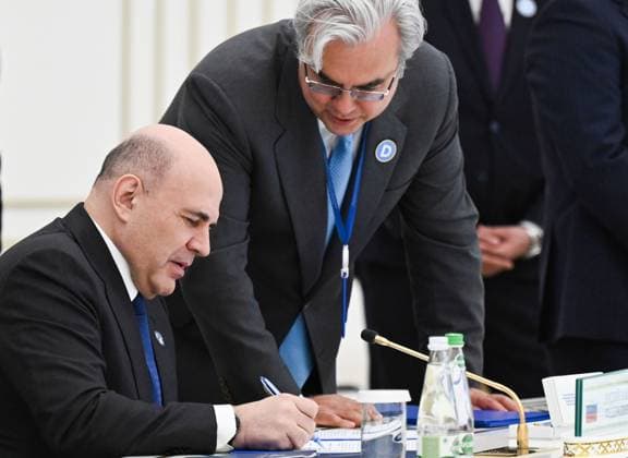 Turkmenistan CIS Government Heads Council 9171511 22.05.2026 Russian Prime Minister Mikhail Mishustin and Deputy Chief of the Russian Government Staff Elmir Tagirov, right, attend a signing ceremony following a meeting of the Commonwealth of Independent States (CIS) Heads of Government Council in Ashgabat, Turkmenistan. Alexander Miridonov Sputnik Ashgabat Turkmenistan  Copyright: xAlexanderxMiridonovx