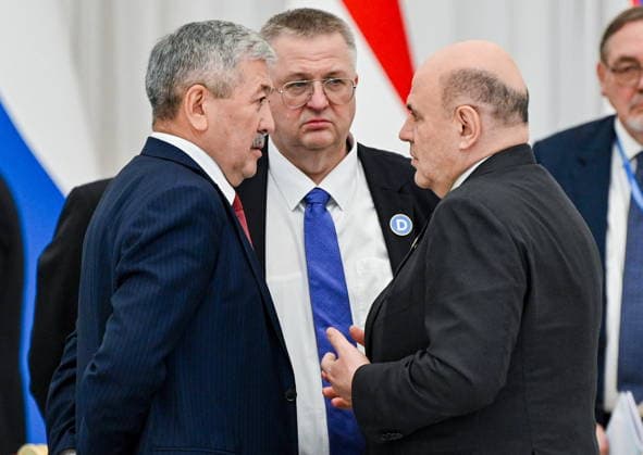 TURKMENISTAN, ASHGABAT - MAY 22, 2026: Mikhail Mishusti, Prime Minister of Russia, his deputy Alexei Overchuk, and Adylbek Kasymaliev (R-L), Chairman of the Cabinet of Ministers Head of the Presidential Administration of Kyrgyzstan, chat during an expanded meeting of the CIS (Commonwealth of Independent States) Council of the Heads of Government at the Garagum Hotel and Business Centre Ashgabat Turkmenistan  - ZUMAt113 20260522_zaa_t113_214 Copyright: xAlexanderxMiridonovx
