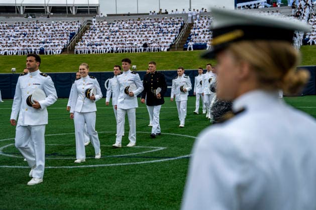 Midshipmen process to begin the U.S. Naval Academy Graduation and Commissioning Ceremony at the U.S. Naval Academy in Annapolis, Maryland on Friday, May 22, 2026. The Naval Academy has a total of 1059 graduates.  ANN20260522305 BONNIExCASH