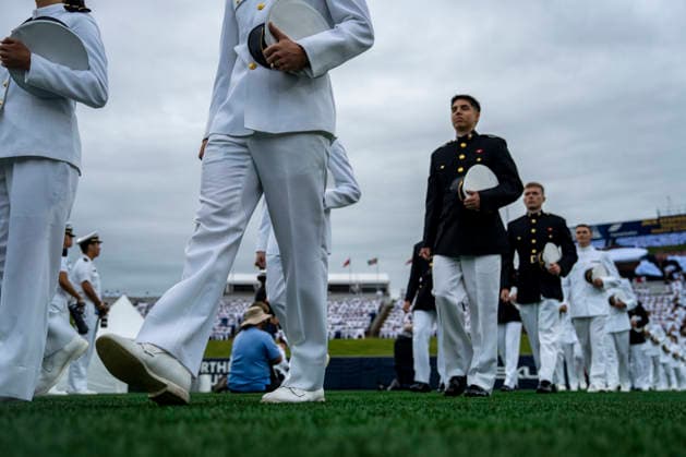 Midshipmen process to begin the U.S. Naval Academy Graduation and Commissioning Ceremony at the U.S. Naval Academy in Annapolis, Maryland on Friday, May 22, 2026. The Naval Academy has a total of 1059 graduates.  ANN20260522306 BONNIExCASH