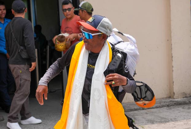 Record holder mountaineer, Kami Rita Sherpa arrived at Tribhuvan International Airport in Kathmandu in Nepal - 22 MAY 2026. Mountaineer and guide, Kami Rita Sherpa seen after setting a new record by successfully scaling Mount Everest for the 32nd time. Kathmandu Nepal Copyright: xSunilxPradhanx xSOPAxImagesx DSC02230