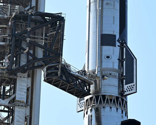 A faulty pin preventing the swing arm to fall away at launch was the cause of Thursday s launch postponement on Orbital Launch Pad 2 at Starbase, Texas on Friday May 22, 2026.SpaceX engineers repaired the pin to allow for another launch attempt today.  SBP20260522003 JOExMARINO