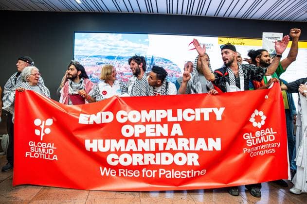 Belgian activists who were part of the Gaza Flotilla arrive at Brussels Airport, in Zaventem, Friday 22 May 2026.  EMILExWINDAL 174748251