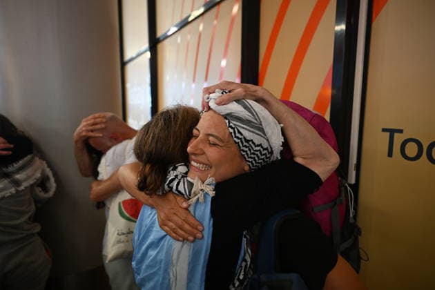 Detained Global Sumud aid flotilla activists arrive in Amsterdam AMSTERDAM, NETHERLANDS - MAY 22: Dutch activists and journalists who were aboard the Global Sumud Flotilla arrive at Amsterdam Airport Schiphol after being deported from Israel via Istanbul, and meet with their supporters and loved ones in Amsterdam, Netherlands on May 22, 2026. Mouneb Taim Anadolu Amsterdam Netherlands. Editorial use only. Please get in touch for any other usage.  Copyright: x2026xAnadoluxMounebxTaimx