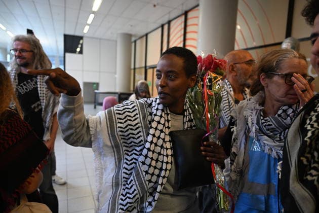 Detained Global Sumud aid flotilla activists arrive in Amsterdam AMSTERDAM, NETHERLANDS - MAY 22: Kokeb Boonk arrives at Amsterdam Airport Schiphol after being deported from Israel via Istanbul following the Global Sumud Flotilla mission, in Amsterdam, the Netherlands on May 22, 2026. Mouneb Taim Anadolu Amsterdam Netherlands. Editorial use only. Please get in touch for any other usage.  Copyright: x2026xAnadoluxMounebxTaimx