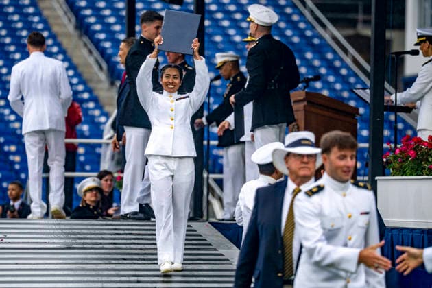 Graduating midshipmen receive their diplomas during the U.S. Naval Academy Graduation and Commissioning Ceremony at the U.S. Naval Academy in Annapolis, Maryland on Friday, May 22, 2026. The Naval Academy has a total of 1059 graduates.  ANN20260522336 BONNIExCASH