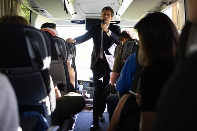 Gabriel Attal anwser journalists questions in a bus - Millau General Secretary of French centrist party Renaissance Gabriel Attal sawer journalist questions about his candidacy to the French presidency, with a microphone in a bus, as he is on his way to visit the Millau viaduct on May 22, 2026. France s former prime minister Gabriel Attal said on May 22, 2026 he was running for president next year. Photo by Raphael Lafargue ABACAPRESS.COM Millau France  Copyright: xLafarguexRaphael ABACAx