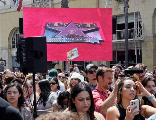 Fans gather for American singer, songwriter and actress Miley Cyrus unveiling ceremony honoring Cyrus with the 2,845th star on the Hollywood Walk of Fame in Los Angeles on Friday, May 22, 2026.  LAP2026052234 JIMxRUYMEN