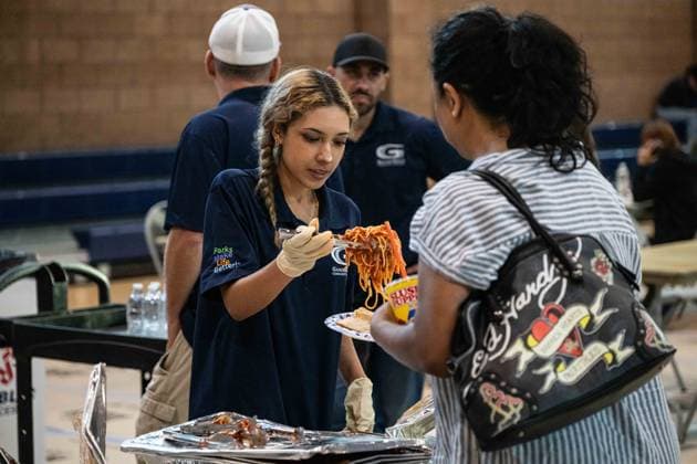 Hazardous materials emergency in Southern California worsens as chemical leak forces evacuation orders for 40,000 residents GARDEN GROVE, UNITED STATES - MAY 22: Garden Grove Sports & Recreation Center employees feed the evacuees a Spaghetti dinner as families await the results of the Chemical Leak in Garden Grove, California in Garden Grove, California, United States on May 22, 2026. Jon Putman Anadolu California United States. Editorial use only. Please get in touch for any other usage.  Copyright: x2026xAnadoluxJonxPutmanx