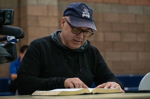 Hazardous materials emergency in Southern California worsens as chemical leak forces evacuation orders for 40,000 residents GARDEN GROVE, UNITED STATES - MAY 22: A Garden Grove resident who was evacuated to the Garden Grove Sports & Recreation Center due to the Chemical Leak at GKN Aerospace Transparency building, is seen reading a bible as he awaits the conclusion of the chemical leak in Garden Grove, California in Garden Grove, California, United States on May 22, 2026. Jon Putman Anadolu California United States. Editorial use only. Please get in touch for any other usage.  Copyright: x2026xAnadoluxJonxPutmanx