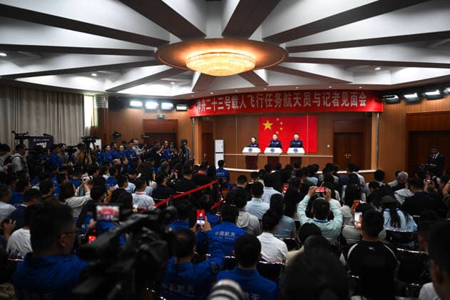 (260523) -- JIUQUAN, May 23, 2026 -- Chinese astronauts Zhu Yangzhu (C), Zhang Zhiyuan (R) and Li Jiaying, or Lai Ka-ying in Cantonese, for the upcoming Shenzhou-23 crewed spaceflight mission, meet the press at the Jiuquan Satellite Launch Center in northwest China, May 23, 2026. ) FOCUS Astronauts of China s Shenzhou-23 mission meet press LianxZhen 