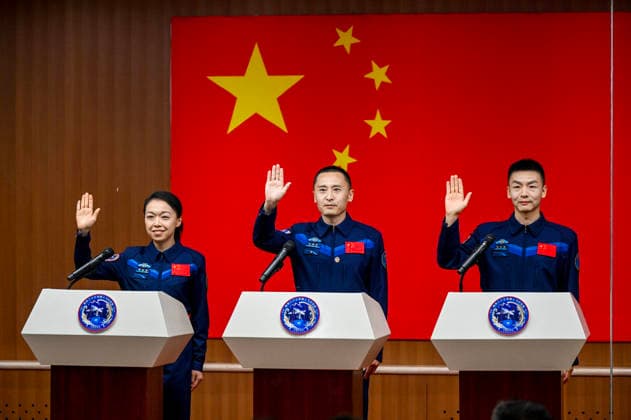 (260523) -- JIUQUAN, May 23, 2026 -- Chinese astronauts Zhu Yangzhu (C), Zhang Zhiyuan (R) and Li Jiaying, or Lai Ka-ying in Cantonese, for the upcoming Shenzhou-23 crewed spaceflight mission, meet the press at the Jiuquan Satellite Launch Center in northwest China, May 23, 2026. ) FOCUS Astronauts of China s Shenzhou-23 mission meet press LianxZhen 