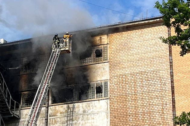 RUSSIA, MOSCOW - MAY 23, 2026: Firefighters battle a fire at a warehouse in south-eastern Moscow. Sergei Shakhidzhanyan TASS  92905835