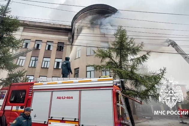RUSSIA, IRKUTSK - MAY 23, 2026: Firefighters battle a fire at Research Institute of Precious and Rare Metals and Diamonds. Video grab. Best quality available. Russia Emergencies Ministry TASS  92905867