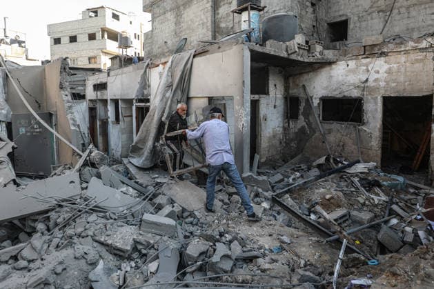 Palestinians inspect damage following Israeli strike in Bureij camp Palestinians inspect damage to homes and streets following an Israeli strike on a house and shops in the Bureij refugee camp in the central Gaza Strip on May 23, 2026. According to residents, the strike came after the collapse of a ceasefire agreement between Hamas and Israel. Photo by Moiz Salhi apaimages Bureij Gaza Strip Palestinian Territory 230526_Al-Bureij_MS_00(7) Copyright: xapaimagesxMoizxSalhixx xapaimagesx