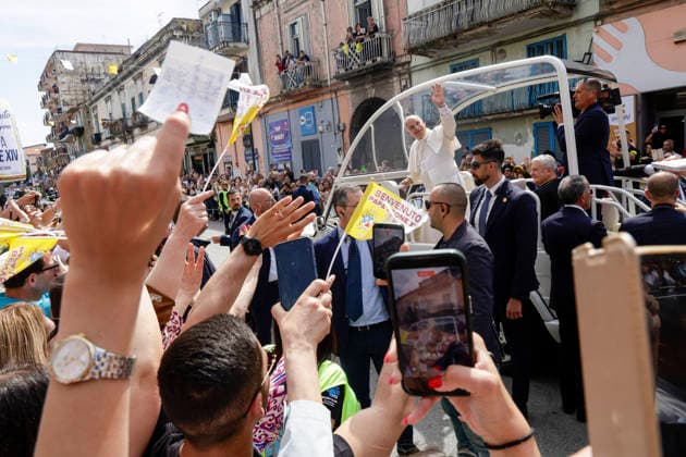Visit of Pope Leo XIV to Acerra Along the streets of Acerra, near Naples, crowds of worshippers gathered to greet Pope Leo XIV as he passed through the town in the popemobile. Thousands of faithful lined the streets waving flags, applauding, and praying during the Pope™s pastoral visit, transforming the town into a moment of collective celebration and devotion.A deeply symbolic event marked by strong public participation and religious fervour. Acerra May 23, 2026. _BPH0374 Copyright: xAntonioxBalascox