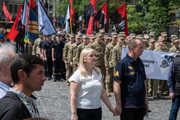 Commemoration procession held on Heroes Day in Lviv, Ukraine LVIV, UKRAINE - MAY 23: Service members and civilians take part in a procession dedicated to the participants of the ATO JFO, veterans, and individuals who lost their lives or are involved in the conflict in Ukraine, during Heroes Day in Lviv, Ukraine on May 23, 2026. Participants marched through the city and held a commemoration for the fallen service members at the burial grounds within the Lychakiv Cemetery. Olena Znak Anadolu Lviv Ukraine. Editorial use only. Please get in touch for any other usage.  Copyright: x2026xAnadoluxOlenaxZnakx