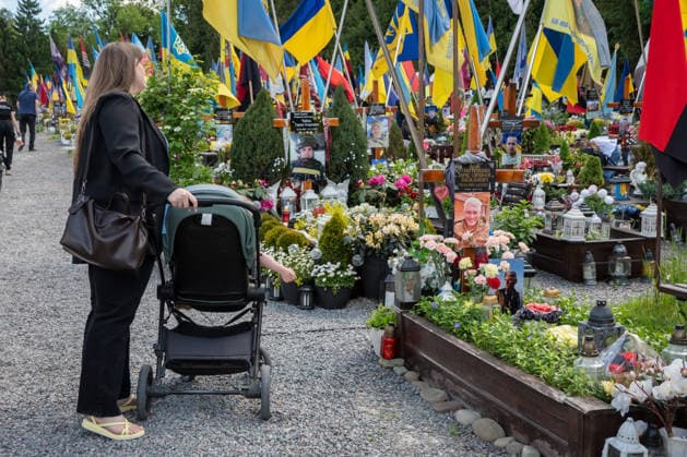 Commemoration procession held on Heroes Day in Lviv, Ukraine LVIV, UKRAINE, MAY 23: Military and civilians take part in a ceremony to honor the memory of fallen servicemen at the honorary burial grounds at the Lychakiv Cemetery during the Day of Heroes of Ukraine in Lviv, Ukraine, May 23, 2026. Also on this day, military personnel, police, members of youth organizations and civilians marched through the city in a solemn procession dedicated to all participants of the ATO JFO, war veterans and participants who died or are fighting for the freedom of Ukraine. Olena Znak Anadolu Lviv Ukraine. Editorial use only. Please get in touch for any other usage.  Copyright: x2026xAnadoluxOlenaxZnakx