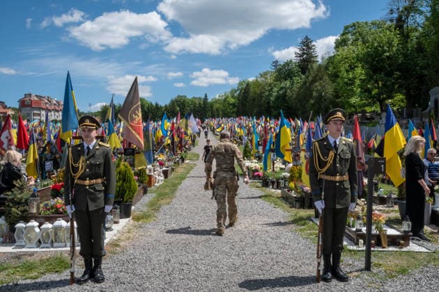 Commemoration procession held on Heroes Day in Lviv, Ukraine LVIV, UKRAINE, MAY 23: Military and civilians take part in a ceremony to honor the memory of fallen servicemen at the honorary burial grounds at the Lychakiv Cemetery during the Day of Heroes of Ukraine in Lviv, Ukraine, May 23, 2026. Also on this day, military personnel, police, members of youth organizations and civilians marched through the city in a solemn procession dedicated to all participants of the ATO JFO, war veterans and participants who died or are fighting for the freedom of Ukraine. Olena Znak Anadolu Lviv Ukraine. Editorial use only. Please get in touch for any other usage.  Copyright: x2026xAnadoluxOlenaxZnakx