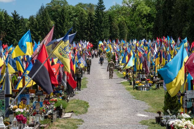 Commemoration procession held on Heroes Day in Lviv, Ukraine LVIV, UKRAINE, MAY 23: Military and civilians take part in a ceremony to honor the memory of fallen servicemen at the honorary burial grounds at the Lychakiv Cemetery during the Day of Heroes of Ukraine in Lviv, Ukraine, May 23, 2026. Also on this day, military personnel, police, members of youth organizations and civilians marched through the city in a solemn procession dedicated to all participants of the ATO JFO, war veterans and participants who died or are fighting for the freedom of Ukraine. Olena Znak Anadolu Lviv Ukraine. Editorial use only. Please get in touch for any other usage.  Copyright: x2026xAnadoluxOlenaxZnakx