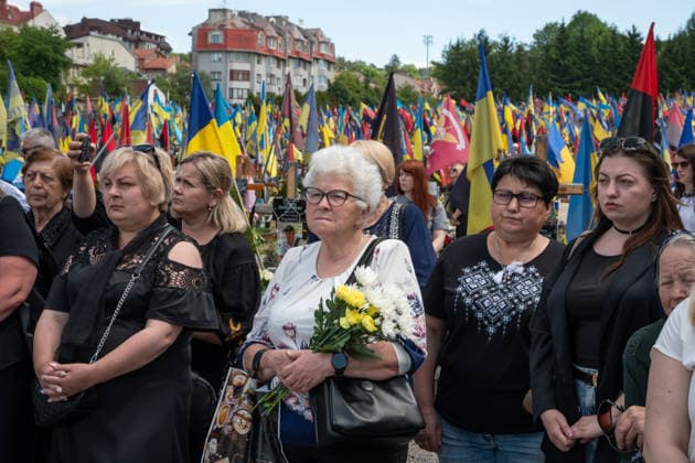Commemoration procession held on Heroes Day in Lviv, Ukraine LVIV, UKRAINE, MAY 23: Military and civilians take part in a ceremony to honor the memory of fallen servicemen at the honorary burial grounds at the Lychakiv Cemetery during the Day of Heroes of Ukraine in Lviv, Ukraine, May 23, 2026. Also on this day, military personnel, police, members of youth organizations and civilians marched through the city in a solemn procession dedicated to all participants of the ATO JFO, war veterans and participants who died or are fighting for the freedom of Ukraine. Olena Znak Anadolu Lviv Ukraine. Editorial use only. Please get in touch for any other usage.  Copyright: x2026xAnadoluxOlenaxZnakx