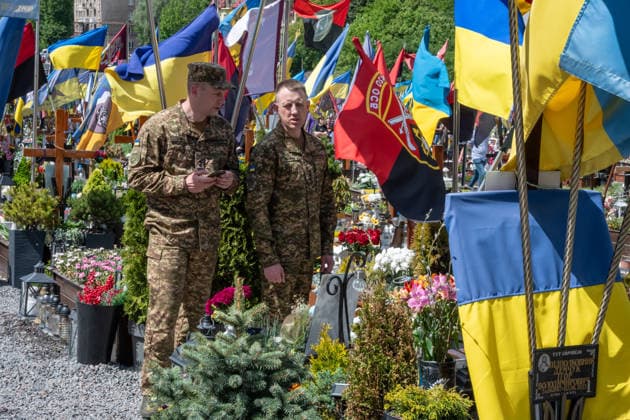 Commemoration procession held on Heroes Day in Lviv, Ukraine LVIV, UKRAINE, MAY 23: Military and civilians take part in a ceremony to honor the memory of fallen servicemen at the honorary burial grounds at the Lychakiv Cemetery during the Day of Heroes of Ukraine in Lviv, Ukraine, May 23, 2026. Also on this day, military personnel, police, members of youth organizations and civilians marched through the city in a solemn procession dedicated to all participants of the ATO JFO, war veterans and participants who died or are fighting for the freedom of Ukraine. Olena Znak Anadolu Lviv Ukraine. Editorial use only. Please get in touch for any other usage.  Copyright: x2026xAnadoluxOlenaxZnakx