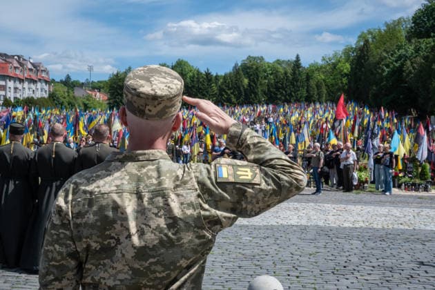 Commemoration procession held on Heroes Day in Lviv, Ukraine LVIV, UKRAINE, MAY 23: Military and civilians take part in a ceremony to honor the memory of fallen servicemen at the honorary burial grounds at the Lychakiv Cemetery during the Day of Heroes of Ukraine in Lviv, Ukraine, May 23, 2026. Also on this day, military personnel, police, members of youth organizations and civilians marched through the city in a solemn procession dedicated to all participants of the ATO JFO, war veterans and participants who died or are fighting for the freedom of Ukraine. Olena Znak Anadolu Lviv Ukraine. Editorial use only. Please get in touch for any other usage.  Copyright: x2026xAnadoluxOlenaxZnakx